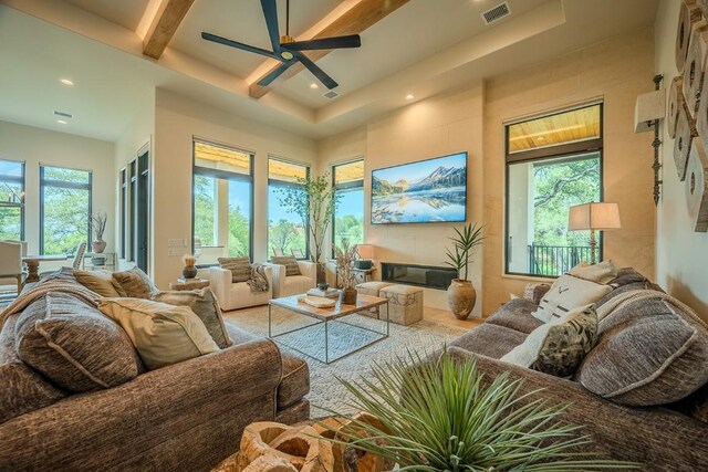104 Megan Ln, Horseshoe Bay, TX 78657 - living room featuring recessed lighting, ceiling fan, beamed ceiling, and coffered ceiling