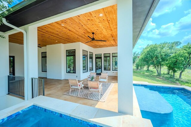 104 Megan Ln, Horseshoe Bay, TX 78657 - swimming pool with ceiling fan and a patio
