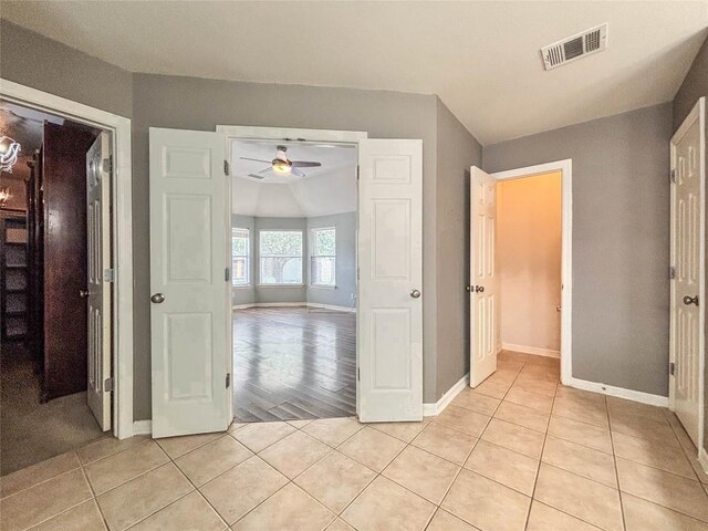 11708 Pillion Pl, Manor, TX 78653 - hall featuring light tile patterned flooring and baseboards