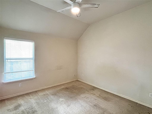 11708 Pillion Pl, Manor, TX 78653 - empty room with a ceiling fan, carpet floors, baseboards, and lofted ceiling