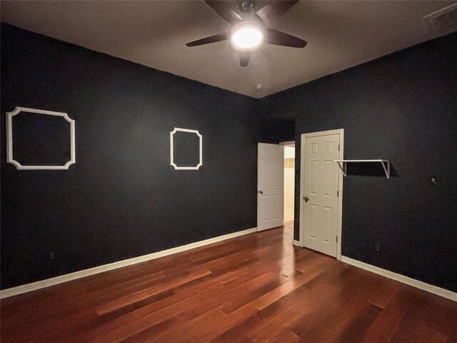 11708 Pillion Pl, Manor, TX 78653 - unfurnished room featuring ceiling fan, wood finished floors, and baseboards