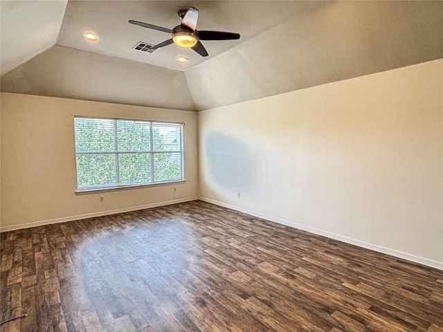 11708 Pillion Pl, Manor, TX 78653 - spare room featuring ceiling fan, dark wood-style flooring, lofted ceiling, baseboards, and recessed lighting