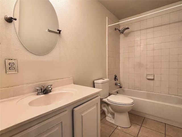 11708 Pillion Pl, Manor, TX 78653 - full bathroom featuring tile patterned flooring, toilet, vanity,  shower combination, and a textured wall