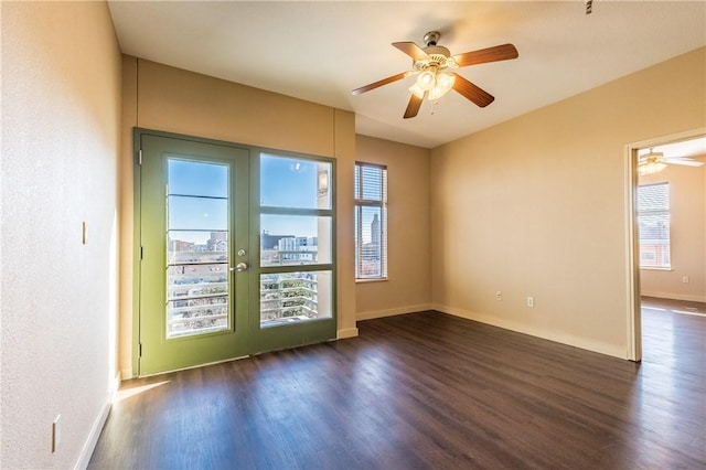 711 W 26th St Unit 703, Austin, TX 78705 - spare room with wood finished floors, plenty of natural light, and a ceiling fan