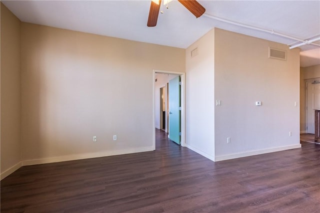 711 W 26th St Unit 703, Austin, TX 78705 - empty room featuring ceiling fan, dark wood-type flooring, and baseboards
