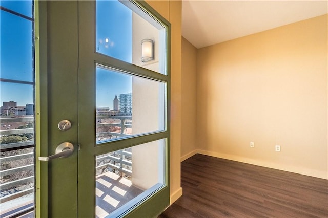 711 W 26th St Unit 703, Austin, TX 78705 - detailed view of a city view, wood finished floors, and baseboards