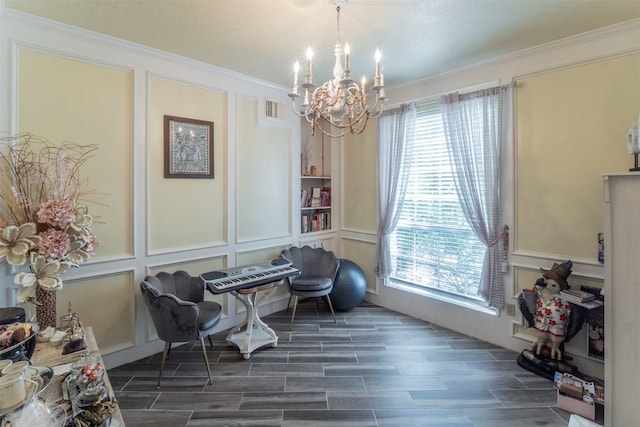 13210 Chriswood Dr, Cypress, TX 77429 - sitting room with a decorative wall, crown molding, a chandelier, healthy amount of natural light, and wood finish floors