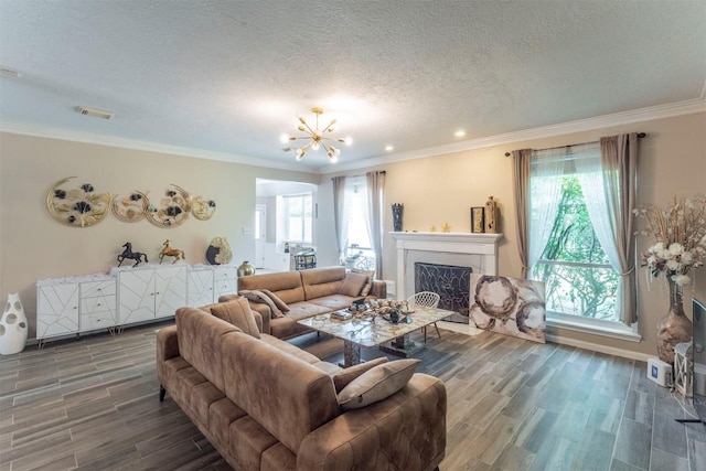13210 Chriswood Dr, Cypress, TX 77429 - living area with wood finished floors, plenty of natural light, a chandelier, a textured ceiling, and ornamental molding