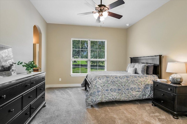 313 Aldea Cv, Georgetown, TX 78633 - carpeted bedroom featuring arched walkways and ceiling fan