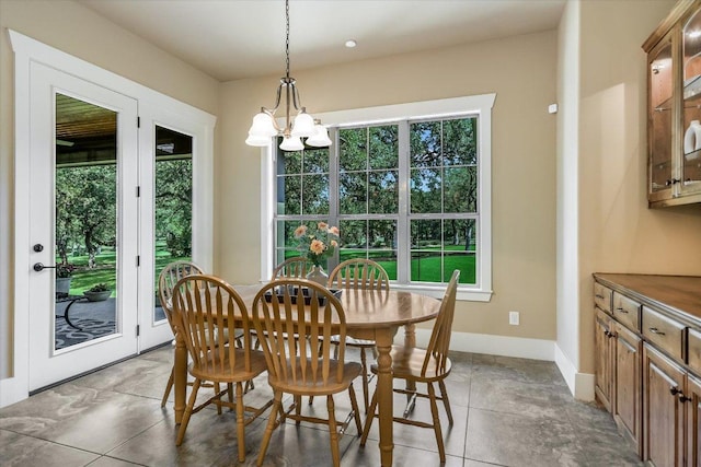 313 Aldea Cv, Georgetown, TX 78633 - dining area featuring plenty of natural light and a chandelier