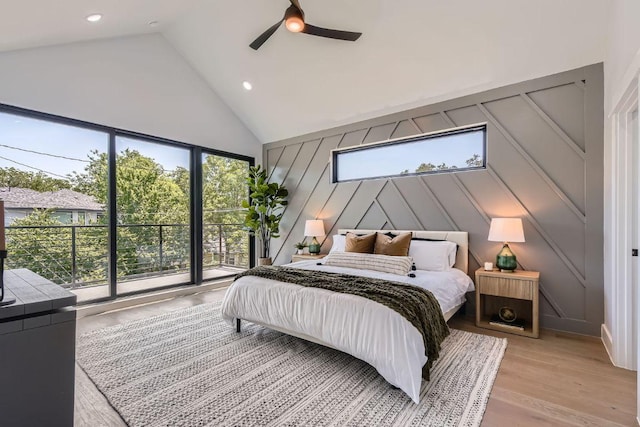 4803 Philco Dr, Austin, TX 78745 - bedroom with high vaulted ceiling, a decorative wall, ceiling fan, light wood finished floors, and recessed lighting