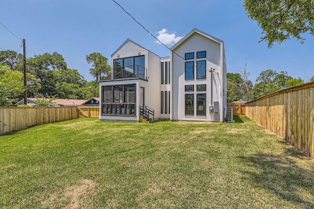 4803 Philco Dr, Austin, TX 78745 - back of property with a balcony and stucco siding