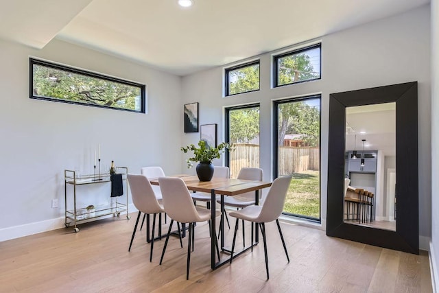 4803 Philco Dr, Austin, TX 78745 - dining space with light wood-type flooring, baseboards, and recessed lighting