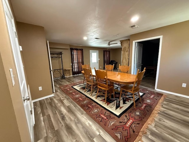 1503 Sioux Trl, Kingsland, TX 78639 - dining room featuring baseboards, wood finished floors, and recessed lighting