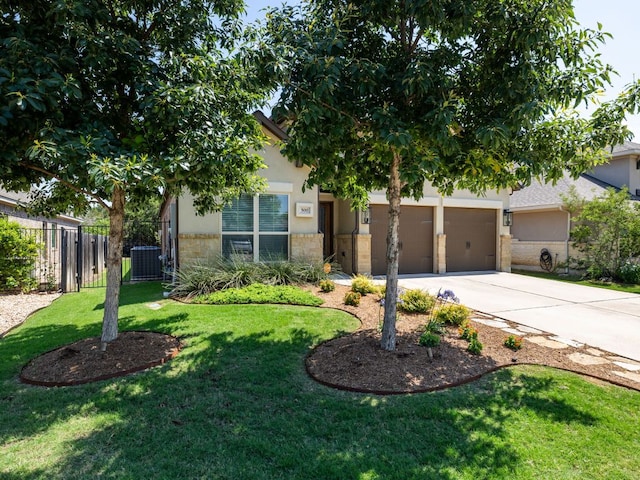 500 Cortona Ln, Georgetown, TX 78628 - view of property hidden behind natural elements with concrete driveway, stucco siding, central AC, and an attached garage
