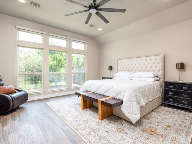 500 Cortona Ln, Georgetown, TX 78628 - bedroom featuring wood finished floors, recessed lighting, lofted ceiling, and a ceiling fan