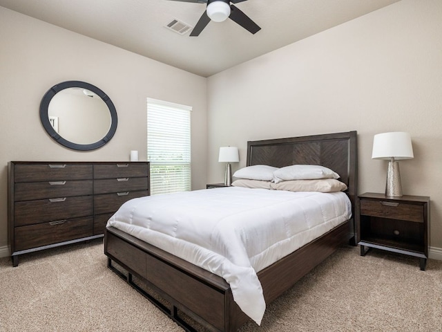 500 Cortona Ln, Georgetown, TX 78628 - bedroom with light carpet, baseboards, and ceiling fan