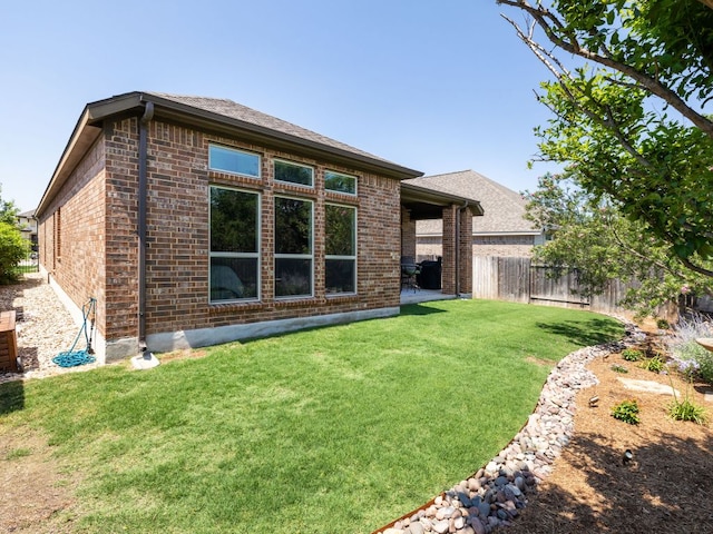 500 Cortona Ln, Georgetown, TX 78628 - rear view of house featuring brick siding