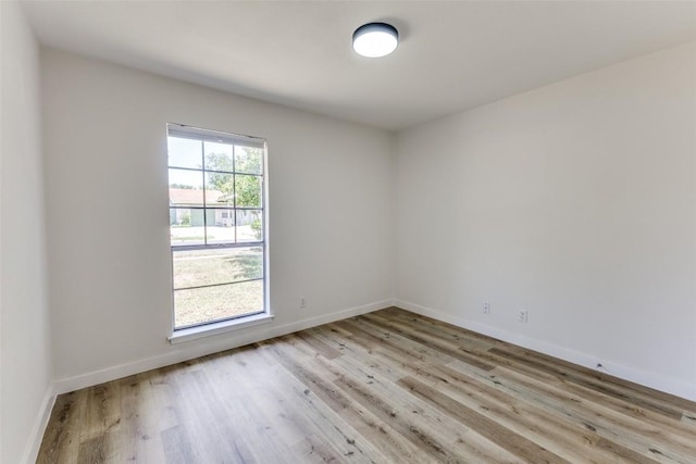 4709 Brassiewood Dr, Austin, TX 78744 - unfurnished room featuring light wood finished floors and baseboards