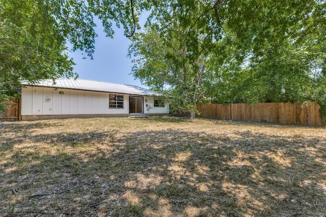 4709 Brassiewood Dr, Austin, TX 78744 - rear view of property featuring metal roof