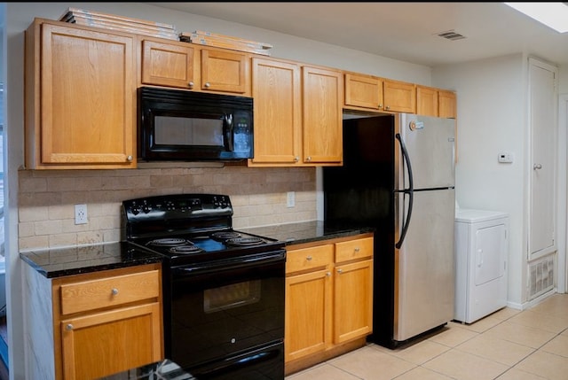 2841 San Gabriel St, Austin, TX 78705 - kitchen with black appliances, washer / clothes dryer, light tile patterned flooring, and decorative backsplash