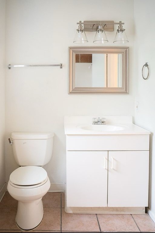 2841 San Gabriel St, Austin, TX 78705 - bathroom featuring vanity, baseboards, toilet, and tile patterned flooring