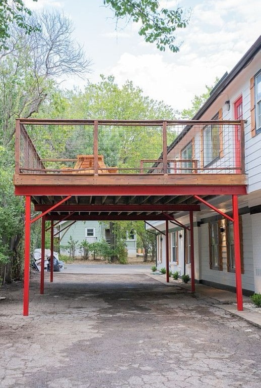 2841 San Gabriel St, Austin, TX 78705 - view of parking featuring a carport and asphalt driveway