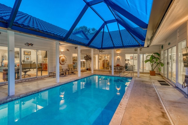 2704 Aurora, Horseshoe Bay, TX 78657 - swimming pool with a patio area and glass enclosure