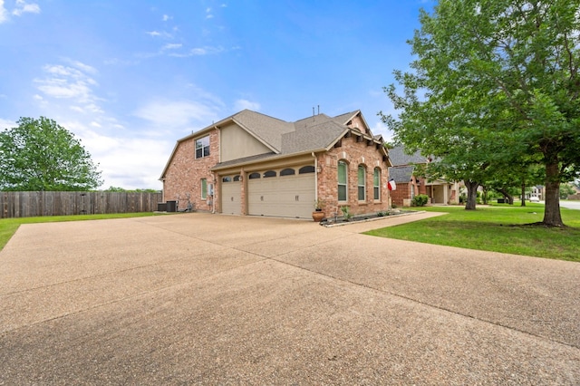 1581 Grassy Field Rd, Austin, TX 78737 - view of front of property featuring brick siding, concrete driveway, a garage, a shingled roof, and central AC unit