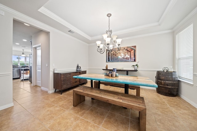 1581 Grassy Field Rd, Austin, TX 78737 - dining space with a tray ceiling, light tile patterned floors, a chandelier, baseboards, and ornamental molding
