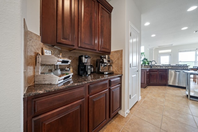 1581 Grassy Field Rd, Austin, TX 78737 - kitchen with dishwasher, backsplash, a sink, recessed lighting, and light tile patterned floors