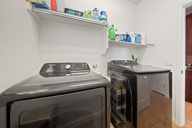 1581 Grassy Field Rd, Austin, TX 78737 - washroom with washer and dryer and light tile patterned floors