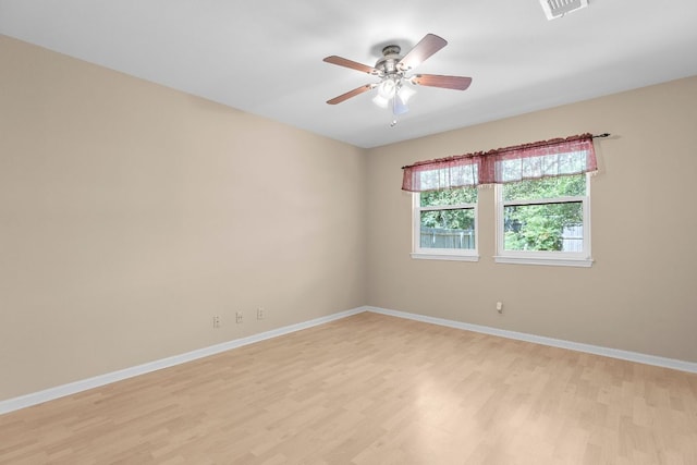 9226 Jollyville Rd Unit 191, Austin, TX 78759 - unfurnished room featuring light wood-style flooring, baseboards, and ceiling fan