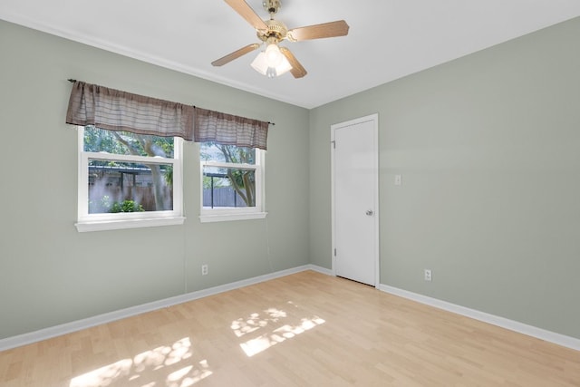 9226 Jollyville Rd Unit 191, Austin, TX 78759 - unfurnished room featuring wood finished floors, baseboards, and a ceiling fan