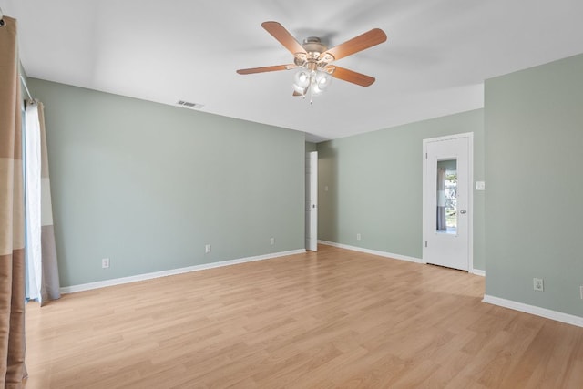 9226 Jollyville Rd Unit 191, Austin, TX 78759 - unfurnished room with ceiling fan, light wood-style floors, and baseboards