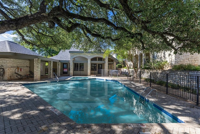 9226 Jollyville Rd Unit 191, Austin, TX 78759 - view of swimming pool with a pool with connected hot tub