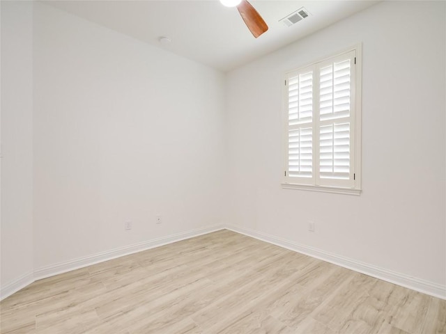 15701 Sayan Cv, Bee Cave, TX 78738 - unfurnished room with ceiling fan, light wood finished floors, and baseboards
