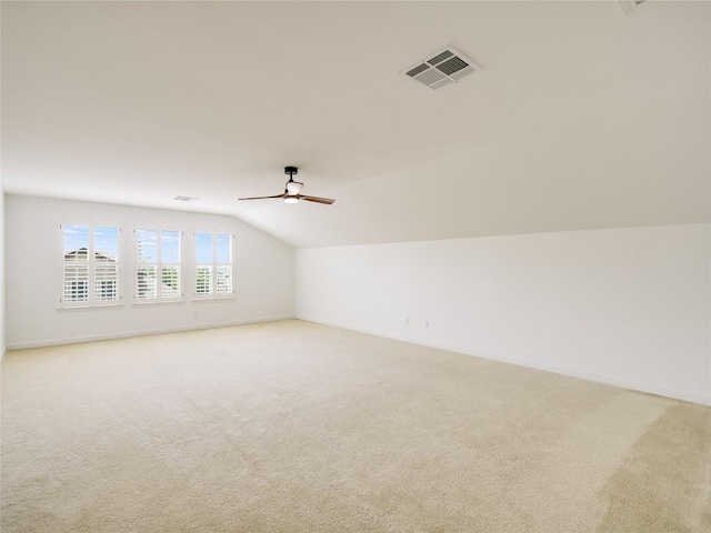 15701 Sayan Cv, Bee Cave, TX 78738 - bonus room with vaulted ceiling, light carpet, ceiling fan, and baseboards