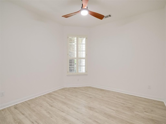 15701 Sayan Cv, Bee Cave, TX 78738 - spare room with light wood-style flooring, ceiling fan, and baseboards