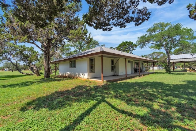 226 Mesa Rdg, Leander, TX 78641 - back of property with a patio area and a yard