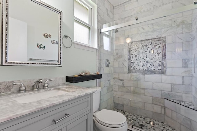 13215 Woodthorpe St, Austin, TX 78729 - full bath featuring a shower stall, toilet, and vanity