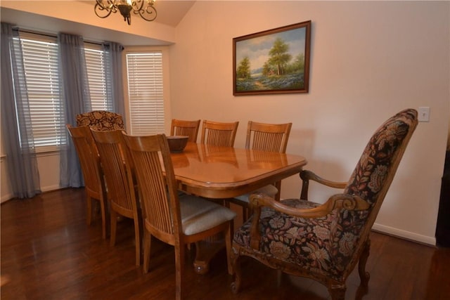 241 Wild Buffalo Dr, Kyle, TX 78640 - dining space with wood finished floors, a chandelier, and vaulted ceiling