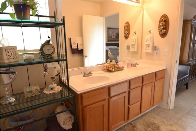 241 Wild Buffalo Dr, Kyle, TX 78640 - bathroom with double vanity and tile patterned floors