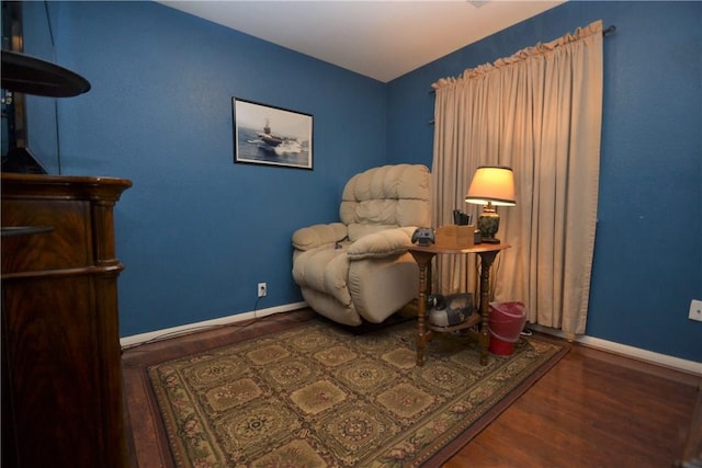 241 Wild Buffalo Dr, Kyle, TX 78640 - living area with baseboards and wood finished floors