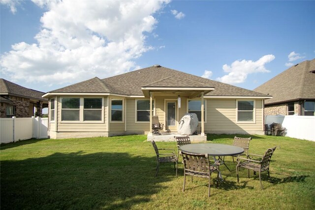19108 Obed River Dr, Pflugerville, TX 78660 - back of property featuring a shingled roof