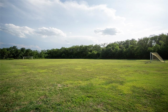 19108 Obed River Dr, Pflugerville, TX 78660 - view of yard featuring an area for soccer, a view of countryside, and a forest view