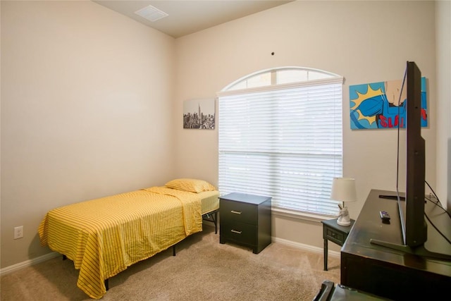 19108 Obed River Dr, Pflugerville, TX 78660 - bedroom featuring multiple windows, carpet, and an office area