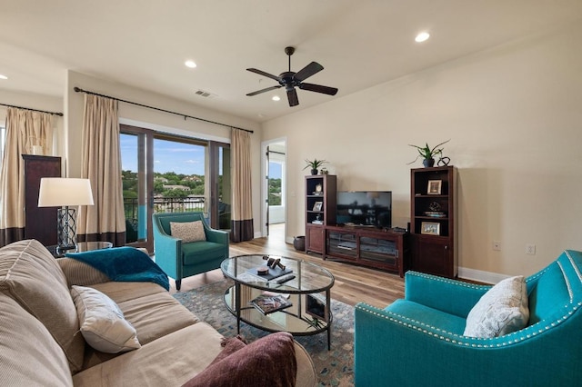 416 Marina Village Cv Unit 416, Austin, TX 78734 - living area featuring wood finished floors, recessed lighting, a ceiling fan, and baseboards