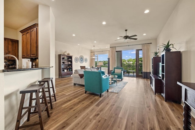 416 Marina Village Cv Unit 416, Austin, TX 78734 - living area with light wood-type flooring, recessed lighting, and ceiling fan
