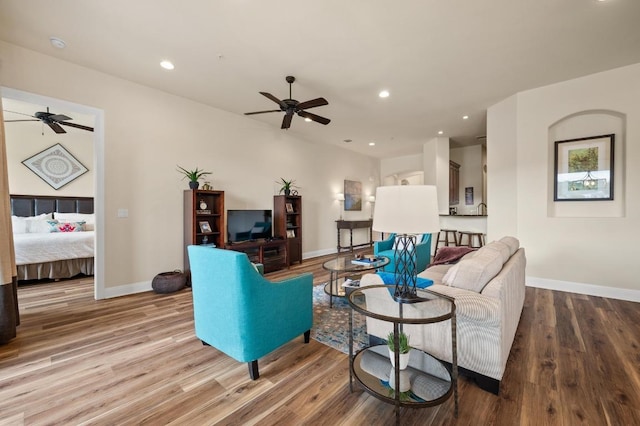 416 Marina Village Cv Unit 416, Austin, TX 78734 - living area with ceiling fan, wood finished floors, baseboards, and recessed lighting